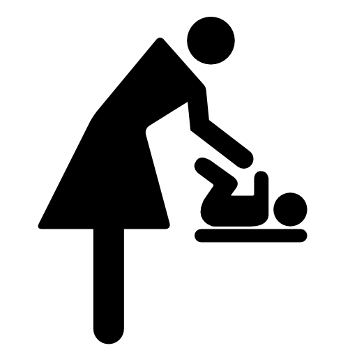 Mother changing baby clothes
