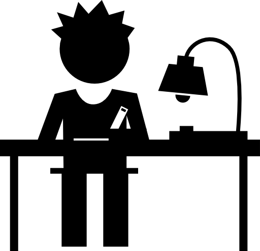 Student writing on his desk